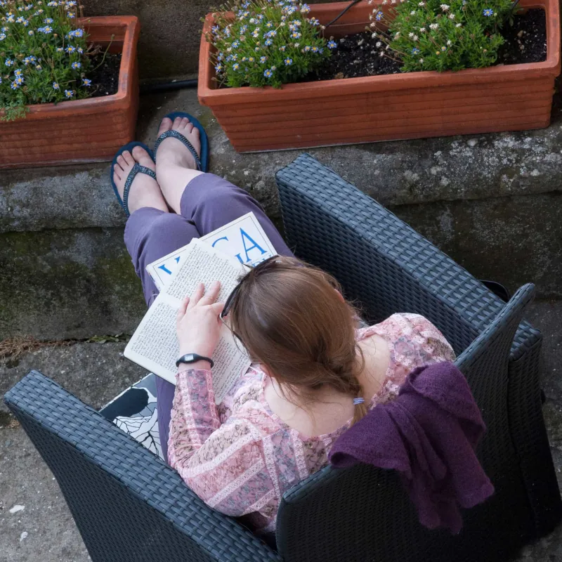 Image: Photograph of Catherine Fitzsimons, reading/writing