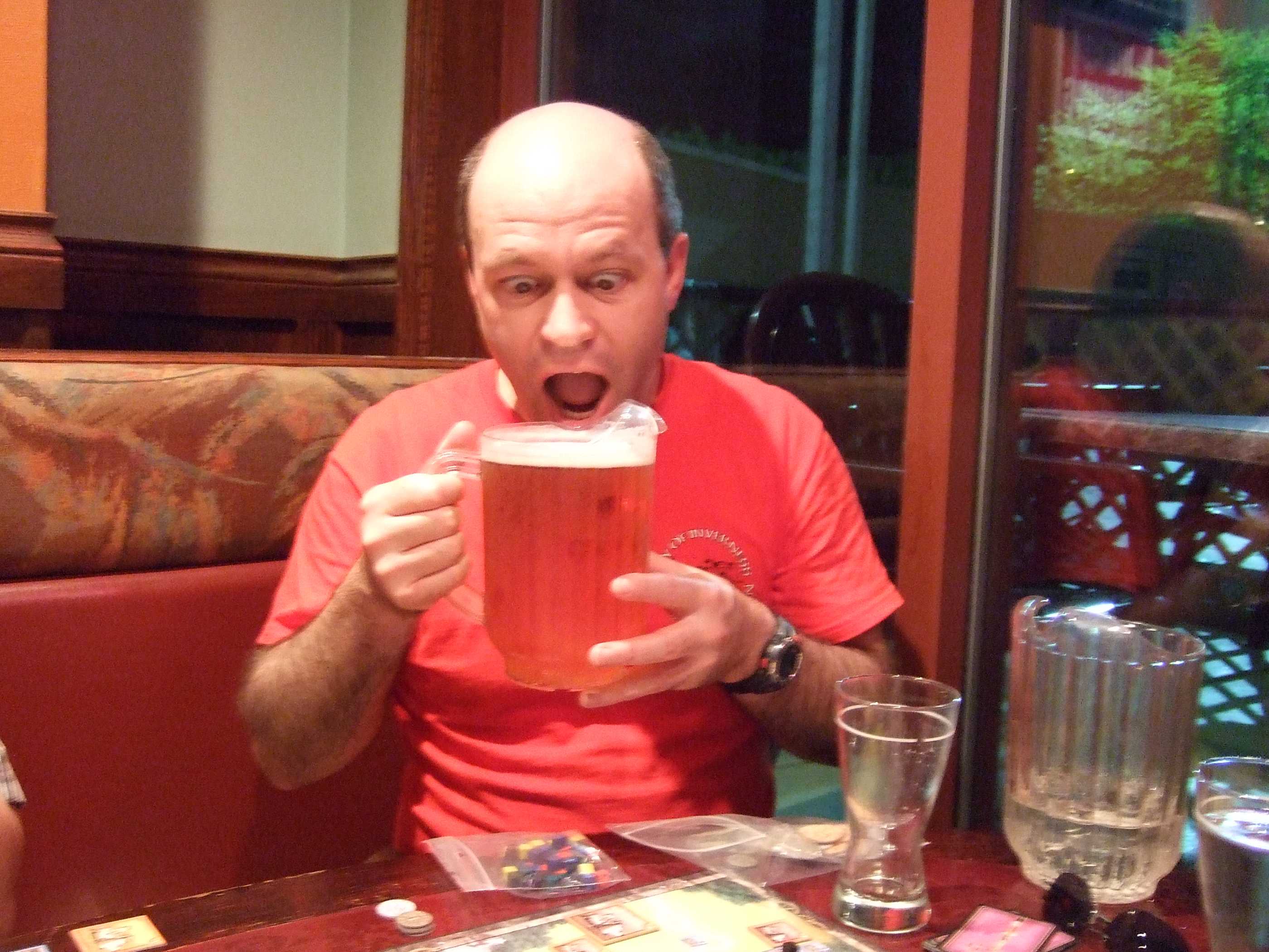 Image: Photograph of Kevin Machin with a jug of beer